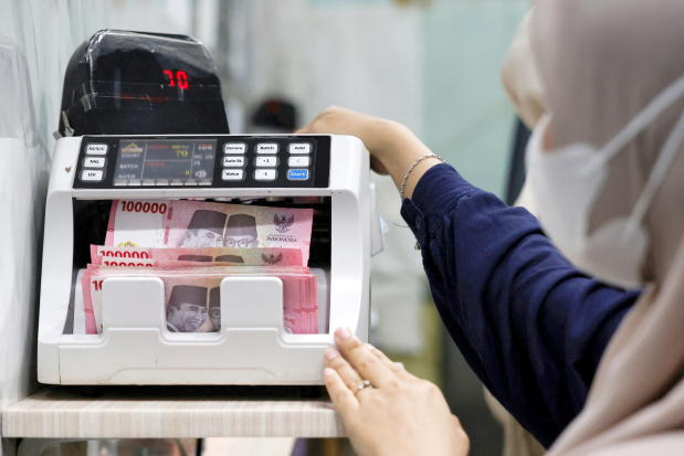 Indonesia’s currency hits record low